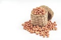 Peanuts without shell in small wicker basket