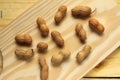 Peanuts shell. Peanuts on the wooden board Royalty Free Stock Photo