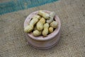 Peanuts in Small wood Bowl