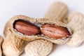 Peanuts on a white background. . Building from nuts. Balance. Open shell. Nutrition. Peanuts butter Royalty Free Stock Photo