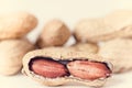 Peanuts on a white background. Isolated. Building from nuts. Balance. Open shell. Nutrition. Peanuts butter Royalty Free Stock Photo