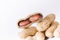 Peanuts on a white background. Isolated. Building from nuts. Balance. Open shell. Nutrition. Peanuts butter Royalty Free Stock Photo