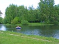 Peaple Sailing In Old Boat On River