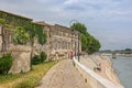 Peaple walking along the banks of the Rhone