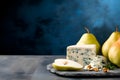 Pear and blue cheese banner with copy space for text. Wine appetizer. Fresh pears with blue cheese on a stone cutting board on