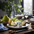 Pear and blue cheese plate on a rustic wooden table, kitchen interior. Wine appetizer. Fresh sliced pear served with blue cheese