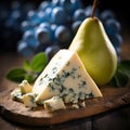 Pear and blue cheese plate, wine appetizer. Gourmet dish concept. Fresh pear slices served with blue cheese and grapes on a wooden Royalty Free Stock Photo