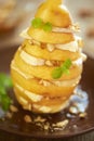 Pear with camembert, chopped almonds and honey