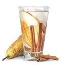 Pear and cinnamon in sweaty glass of lemonade Royalty Free Stock Photo