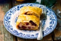 Pear and cranberry strudel .selective focus. Royalty Free Stock Photo