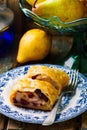 Pear and cranberry strudel .selective focus. Royalty Free Stock Photo