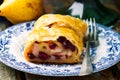 Pear and cranberry strudel .selective focus. Royalty Free Stock Photo