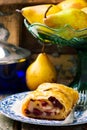 Pear and cranberry strudel .selective focus. Royalty Free Stock Photo