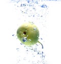 Pear falling in water Royalty Free Stock Photo