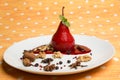 Pear flavored with red wine with Brachetto syrup and crunch nuts