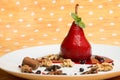 Pear flavored with red wine with Brachetto syrup and crunch nuts