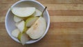 Pear fruit slices in bowl Royalty Free Stock Photo