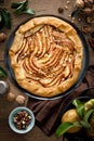 Pear galette with walnuts, cinnamon and lemon zest, autumn fruit pie with nuts
