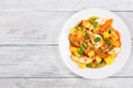 Pear, kiwi, apricot,mango salad with muesli Royalty Free Stock Photo