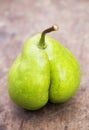 A pear looks like a botty, cellulite or diet concept