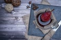 Pear with red wine served in a glass bowl on a slab in rustic presentation on a wooden table. Aerial view Royalty Free Stock Photo