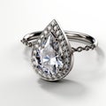 Pear Shaped White Gold Diamond Engagement Ring With Textured Band