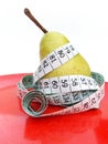 Pear with Tape Measure Concept Royalty Free Stock Photo