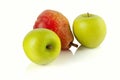 A pear and two green apples Royalty Free Stock Photo