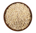 Pearl barley in a bowl on a white background. Top view. Royalty Free Stock Photo