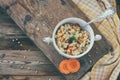 Pearl barley porridge with carrots, onions in white bowl Royalty Free Stock Photo