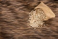 Pearl barley in sack on a wooden table - Hordeum vulgare Royalty Free Stock Photo