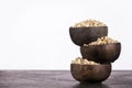 Pearl barley in three wooden bowls - Hordeum vulgare Royalty Free Stock Photo