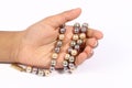 Pearl chain in the hand Royalty Free Stock Photo