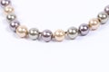 Pearl chain in white background Royalty Free Stock Photo