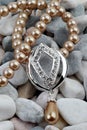Pearl, diamond jewelery on stones