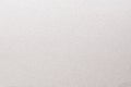 Pearl gray paper background with a matte crosshatch texture and subtle, refined tones. Light gray