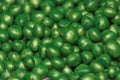 Pearl green plastic particles