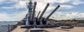 Pearl Harbor, Hawaii, USA - September 24, 2018: Panoramic shot of huge cannons and deck of USS Missouri docked in Pearl Harbor. Royalty Free Stock Photo