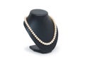 Pearl necklace on black mannequin isolated Royalty Free Stock Photo