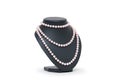 Pearl necklace on black mannequin isolated Royalty Free Stock Photo