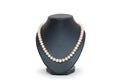 Pearl necklace on black mannequin isolated Royalty Free Stock Photo