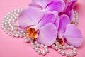 Pearl necklace and Purple orchid Royalty Free Stock Photo