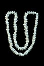 Pearl beads gemstone on black background. Royalty Free Stock Photo