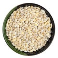Pearled barley grains in round bowl isolated Royalty Free Stock Photo