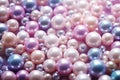 Pearls background. Pile of large pink pearls closeup. Pearl texture