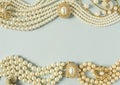 Pearls background. Woman`s Jewelry. Vintage jewelry background. Beautiful gold tone and pearls brooches, braceletes, necklaces an Royalty Free Stock Photo