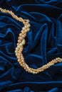 Pearls on blue velvet Royalty Free Stock Photo