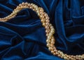 Pearls on blue velvet Royalty Free Stock Photo