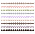 Pearls necklace of different colors. Royalty Free Stock Photo