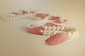 Pearls necklace and rose petals vintage background